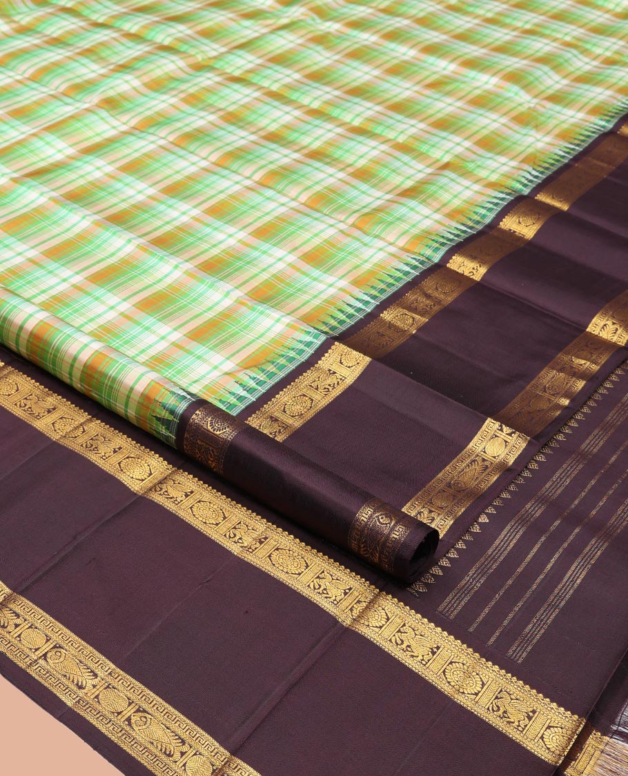 Green Checked Kanchipuram Silk Saree, a Contrast Rettai Pettu Temple Border of Chakram and Kuthirai Designs, Traditional Pallu, and Contrast Blouse