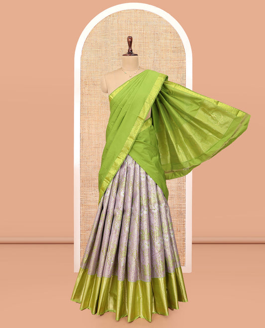Grey and Green Art Silk Material Half-Saree Set, Woven with Jacquard Design Skirt, Complemented by Captivating Contrast Traditional Zari Designs Woven Border, Paired with a Contrast Blouse and Comes with a Paisley Designs Woven Dhavani