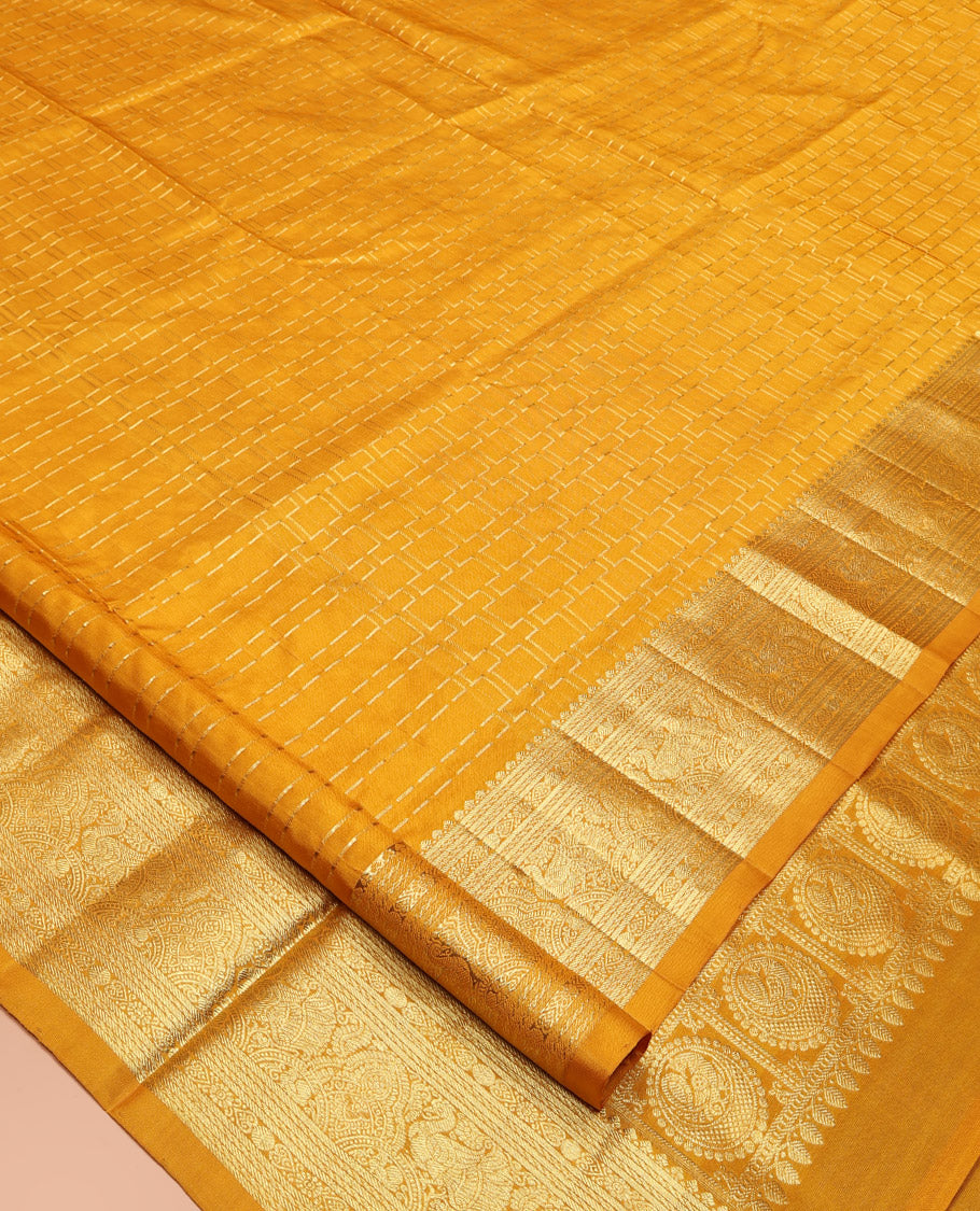 Yellow Venkatagiri Silk Saree, Gleamed Up with Geometric Design All Over Its Body, Highlightad by a Traditional Zari Design Border, Grand Jaal Pallu, and Paired with a Matching Blouse