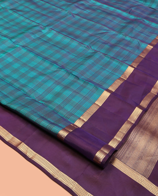 Blue Vasundhara Lite Silk Mix Saree, Embellished with Checks, Complemented by a Contrast Traditional Zari Rettai Pettu Border, Zari Design Pallu, and a Contrast Blouse