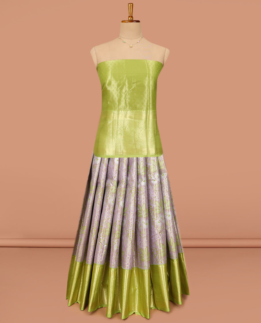 Grey and Green Art Silk Material Half-Saree Set, Woven with Jacquard Design Skirt, Complemented by Captivating Contrast Traditional Zari Designs Woven Border, Paired with a Contrast Blouse and Comes with a Paisley Designs Woven Dhavani