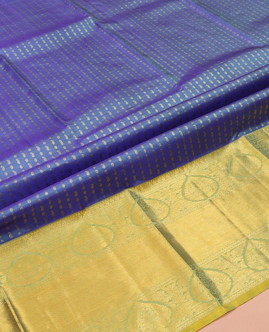 Blue Pure Silk Half-Saree, Detailed with Zari Buttas All Over Its Skirt, Complemented by Contrast Traditional Zari Design Border, Paired with a Contrast Blouse, and Comes with a Jaal Design Dhavani