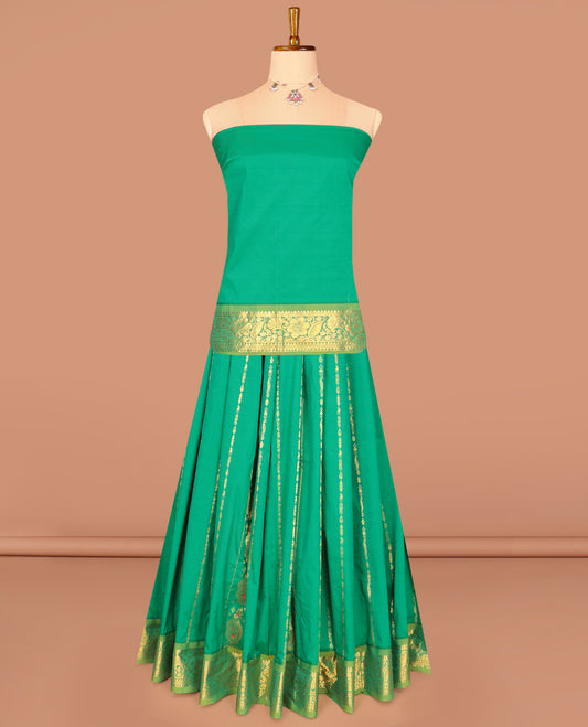 Green Art Silk Pavadai Material Set, Decked Up with Zari Designs on Its Skirt, Complemented by a Contrast Paisley-Floral Zari Border, and a Matching Blouse