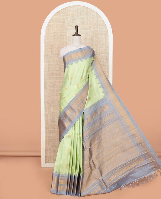 Pista Green Gadwal Saree Woven with Zari Paisley Buttas, a Contrast Temple Traditional Zari Design Border, Pallu of Jaal Design, and a Contrast Blouse with Zari Designs