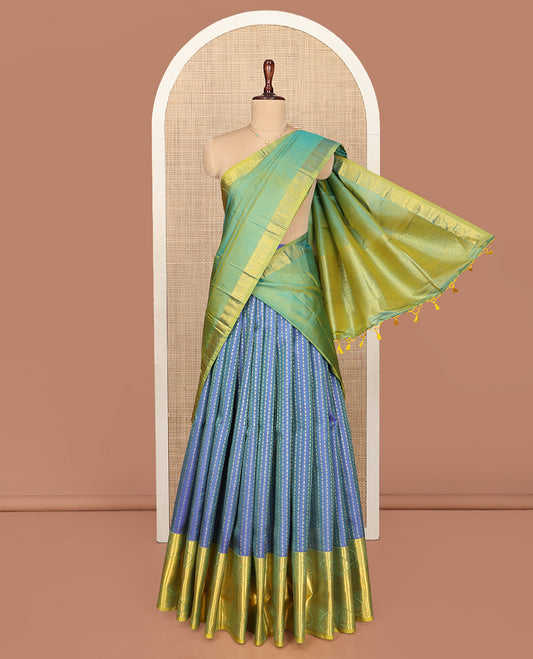 Blue Pure Silk Half-Saree, Detailed with Zari Buttas All Over Its Skirt, Complemented by Contrast Traditional Zari Design Border, Paired with a Contrast Blouse, and Comes with a Jaal Design Dhavani
