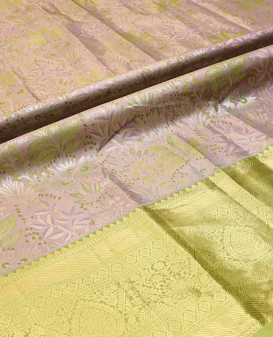 Grey and Green Art Silk Material Half-Saree Set, Woven with Jacquard Design Skirt, Complemented by Captivating Contrast Traditional Zari Designs Woven Border, Paired with a Contrast Blouse and Comes with a Paisley Designs Woven Dhavani