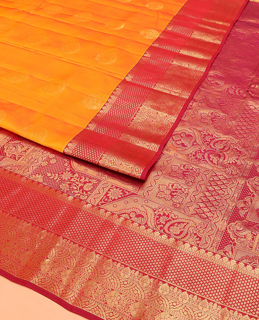 Orange Vasundhara Lite Silk Mix Saree Adorned with Zari Buttas, Featuring a Contrast Floral Zari Design Border, Zari Elevated Pallu of Muughal-Style Floral Designs, and a Contrast Blouse