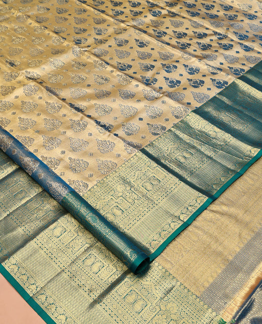 Gold Kanchipuram Tissue Silk Saree, Gracefully Embellished with Jacquard, Contrast Border of Thilakam Mokku, Muthu, Kodi Visiry, Manga, and Mayil Kann, Grand Pallu, and Matching Blouse