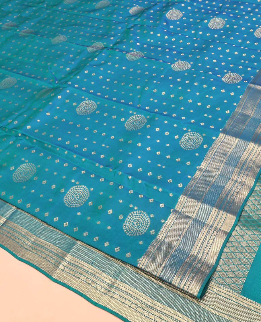 Blue Vasundhara Lite Silk Mix Saree, Adorned with Zari Buttas All Over Its Body, Highlighted by Traditional Zari Designs Woven Border, Grand Jaal Pallu and Paired with a Matching Blouse