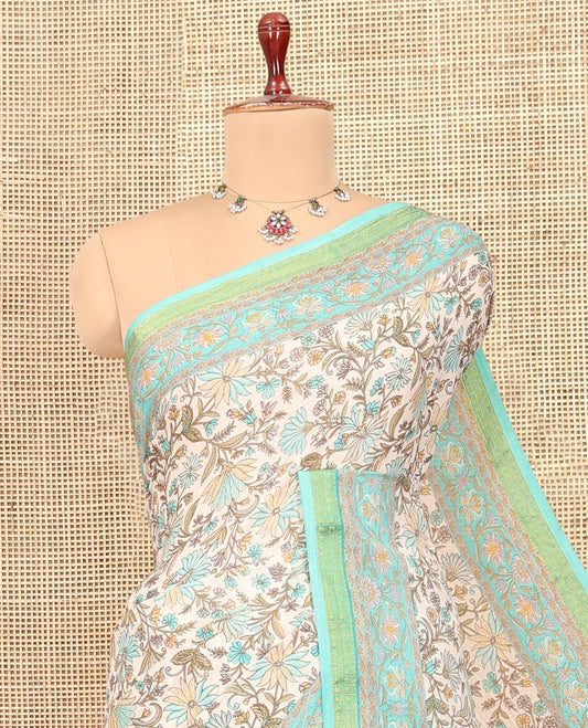 Off-White Base Printed Silk Saree, Finely Crafted with Floral Vine Print, a Contrast Floral Printed Zari Border, Floral Printed Pallu, and a Contrast Blouse