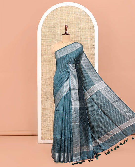 Blue Banana Pith Saree, Detailed with Zari Stripes All Over Its Body, Highlighted by Temple Border of Jaal Designs, Subtly Striped Pallu, and Paired with a Matching Blouse