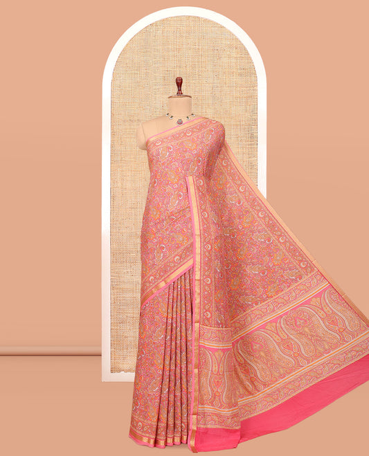 Pink Printed Silk Saree, Decked Up with Floral-Paisley Print, a Traditional Zari Border, Paisleys Pallu, and a Matching Blouse