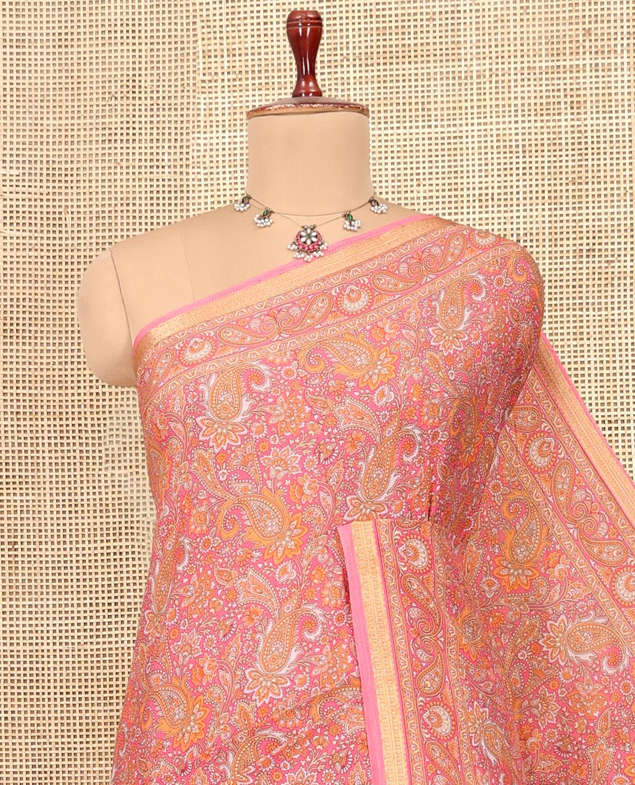 Pink Printed Silk Saree, Decked Up with Floral-Paisley Print, a Traditional Zari Border, Paisleys Pallu, and a Matching Blouse