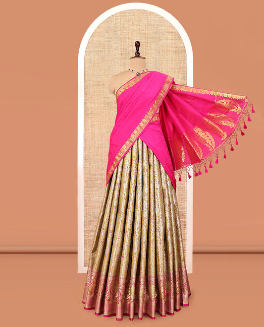 Gold Art Silk Material Half Saree, Ornamented with Jacquard Skirt, a Contrast Meenakari Border, Contrast Blouse, and an Intricate Dhavani
