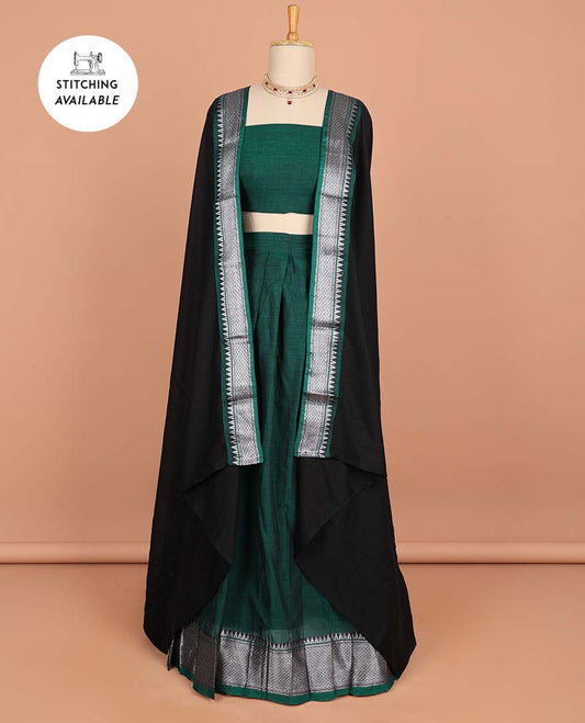 Green cotton half saree with contrast traditional border, plain blouse & plain dhavani with zari design border