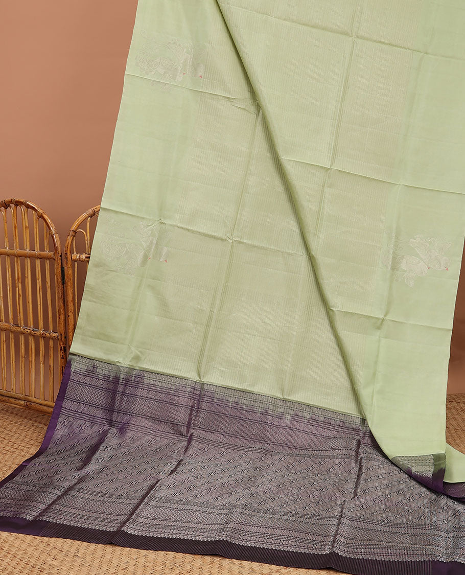 Borderless green soft silk saree with zari designs, contrast pallu of banaras,mayil kann,poun, diamond & manga design