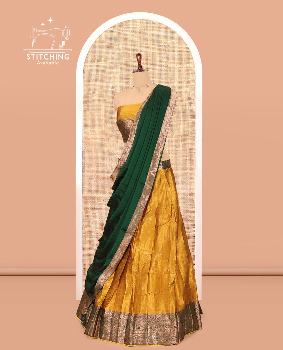 Yellow-Green Shimmer Tissue Half-Saree Features Buttas Skirt, a Contrast Traditional Border, a Matching Blouse, a Contrast Dhavani