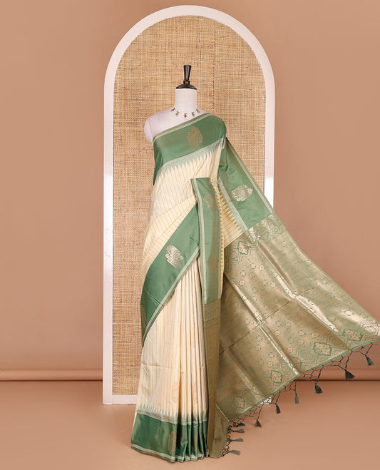 Sandal striped and zari buttas Mulberry silk saree, contrast temple zari buttas border, intricate pallu, and contrast zari design blouse