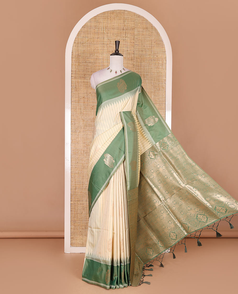 Sandal striped and zari buttas Mulberry silk saree, contrast temple zari buttas border, intricate pallu, and contrast zari design blouse