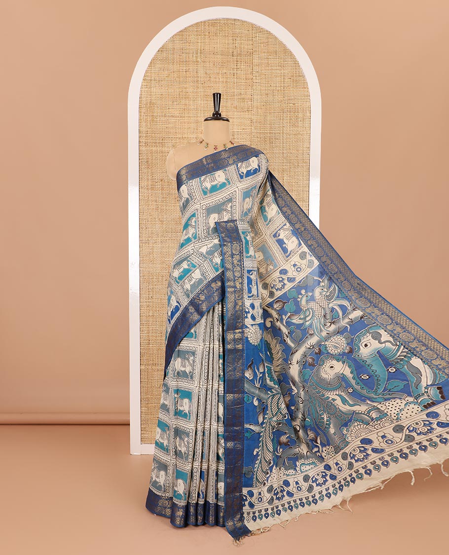 Blue kalamkari-style pichwai printed Mangalagiri cotton saree with contrast traditional zari border, kalamkari printed pallu, and a floral vine printed blouse