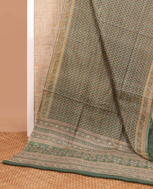Green leaf design printed silk saree with contrast intricate design border & floral design pallu