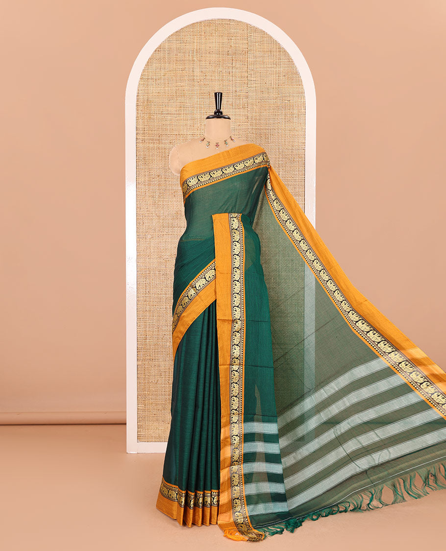 Green plain mercerised cotton saree, contrast kal erangina thread border of elephant motifs, striped pallu, and a matching blouse