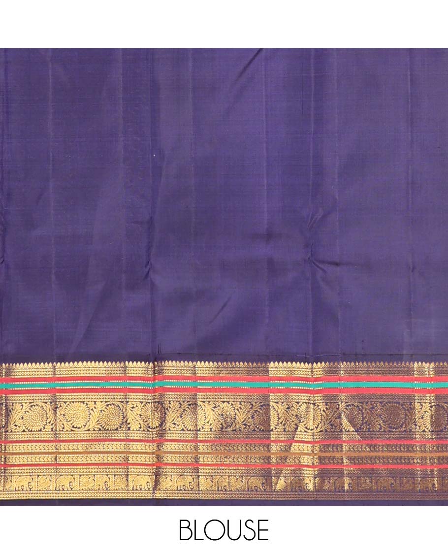 Orange annam chakram buttas Kanchipuram korvai silk saree, contrast rettai pettu korvai border of rekku, banaras, muthu, and chakram designs, and poun design steeped pallu
