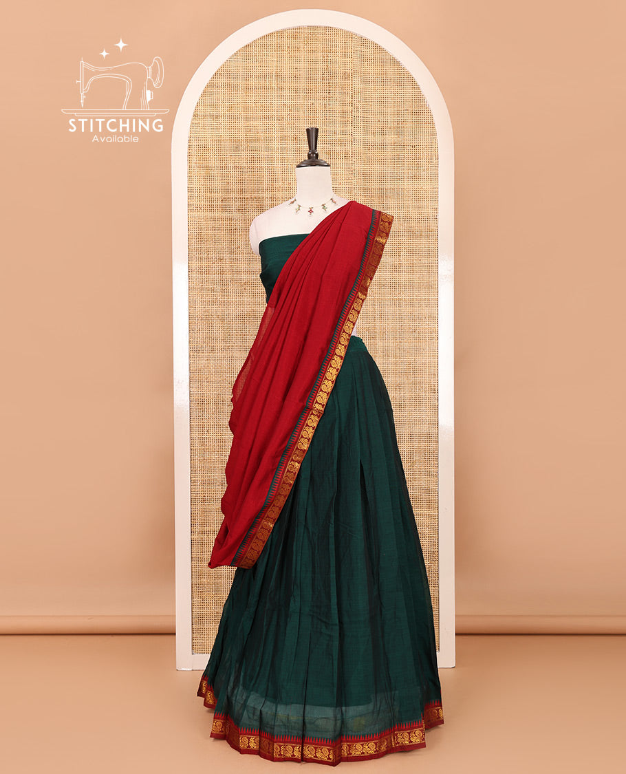 Green mercerized cotton half-saree, plain & contrast peacock motifs gold zari temple border skirt, matching blouse & temple zari border vichitra silk dhavani