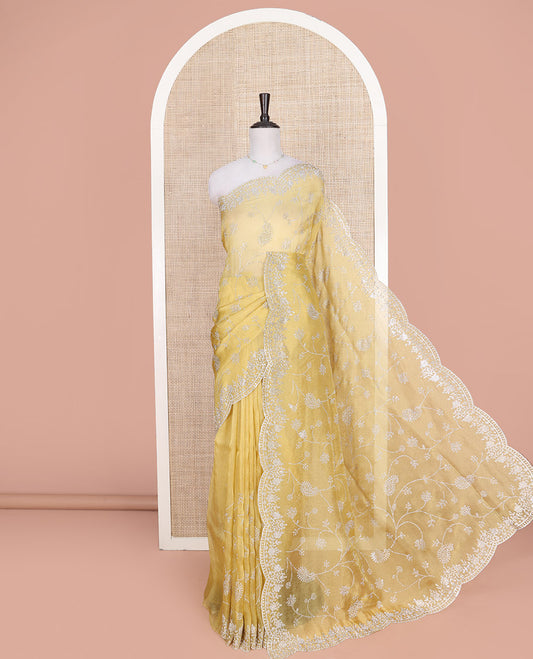 Pale Yellow Designer Saree, Mesmerized with Floral-Paisley Jaal Stone Work on Its Body, Highlighted by Scallop Stone Work Border, Pallu of Floral-Paisley Designs, and Paired with a Stone Work Matching Blouse