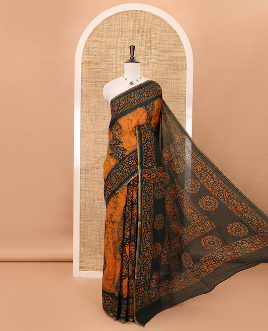 Mustard batik-printed sungudi cotton saree, mango zari small border, batik-printed pallu & running blouse