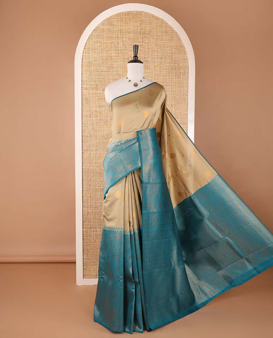 Borderless chikku-blue zari buttas & half-&-half vanasingari-style flora-fauna woven kanchi silksaree,self-pallu & blue blouse of zari brocade