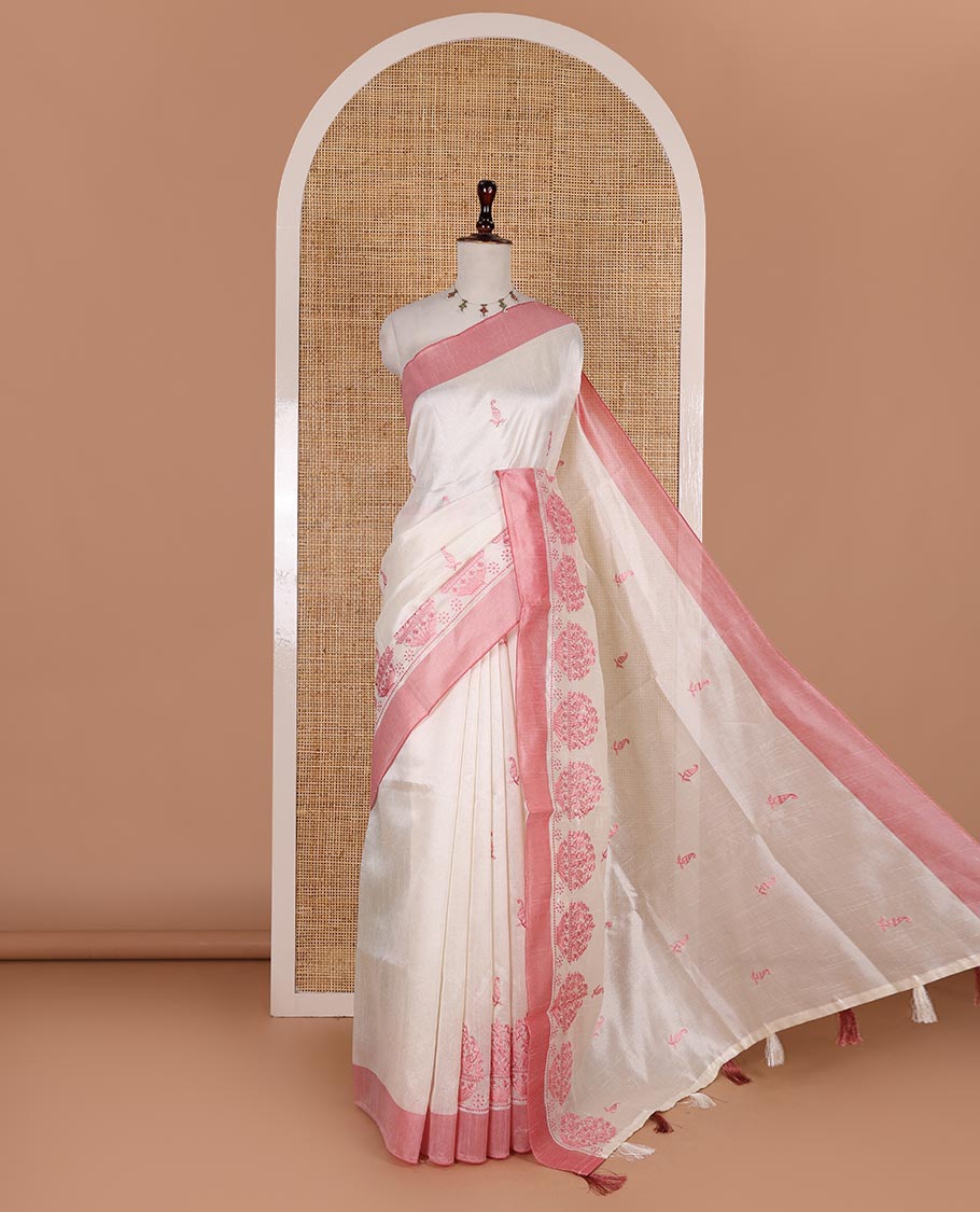 Half-white mango and flower pots thread embroidered semi-tussar saree, contrast peach border, manga motif embroidered pallu, and a matching blouse