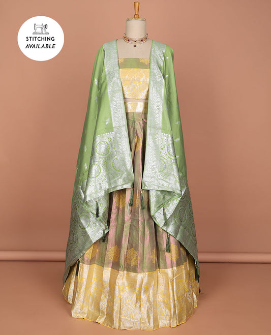 Green floral motifs half saree with contrast intricate zari design border, zari design blouse & floral zari design dhavani
