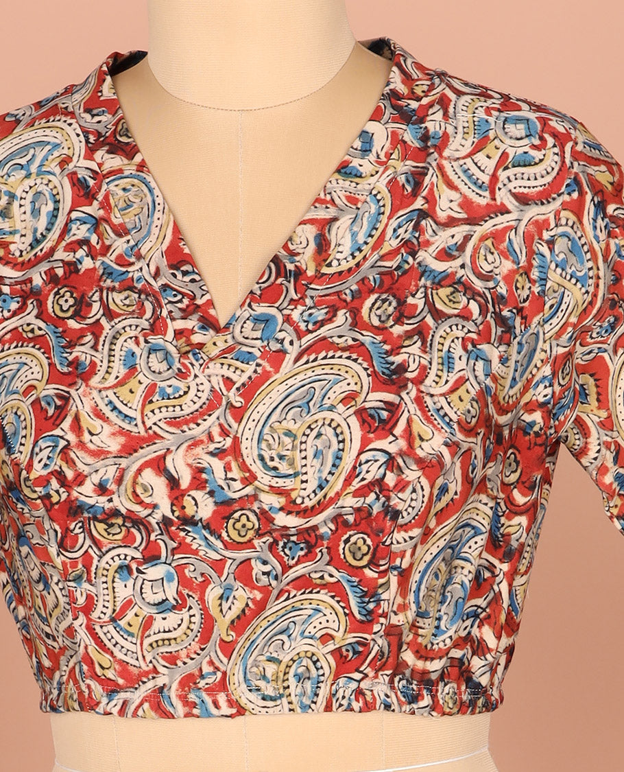 Red-base Readymade Blouse Elegantly Printed with Floral-Paisley Vine, Featuring a Front V-Neck, a Back Closed Neck, and Full Sleeves