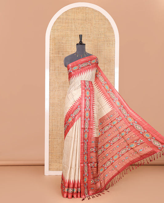 Chikku- maroon plain Katan silk saree, contrast ikkat floral-geometric printed temple border, ikkat printed pallu, and ikkat printed blouse