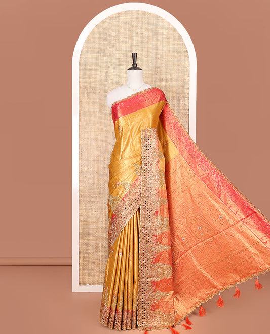 Yellow Vastrakala Silk Saree, Decked up with Jacquard and Embroidery Work, Complemented by Contrast Traditional Zari and Cut Embroidered Scallop Border, Gleaming Grand Zari-Stone Work Pallu, and Paired with Contrast Heavy Stone Embroidered Blouse