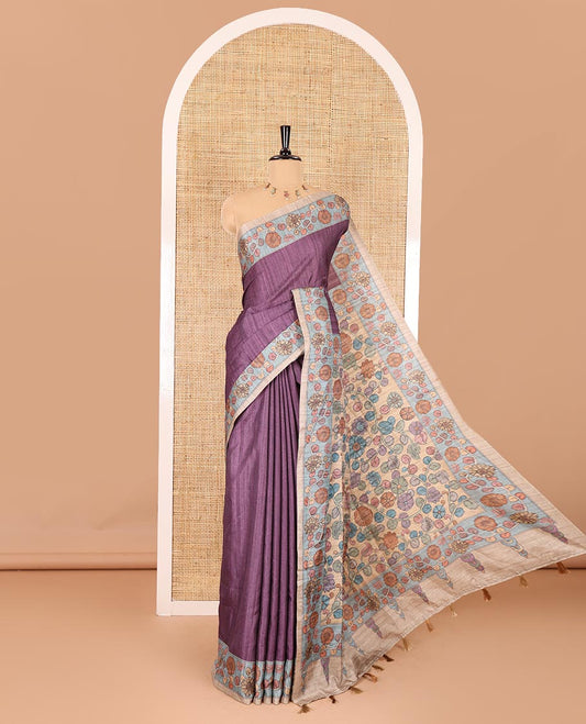 Purple plain fancy tussar saree, contrast floral creeper border, pallu of kalamkari floral vine print, and floral printed blouse