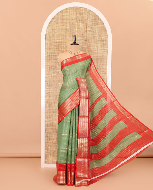 Green horizontal zari striped moss chiffon saree, contrast traditional zari border, striped pallu, and a contrast zari design blouse