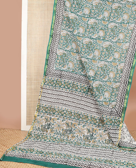 Sea green floral design machine printed kalamkari cotton saree with contrast zari border & floral design pallu