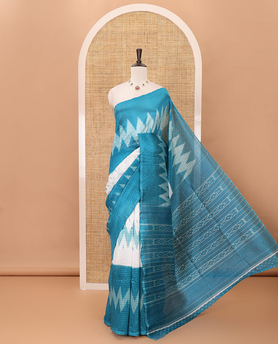 Borderless white 3-layer ikkat chevron printed litchi crushed saree, ikkat printed pallu & small butta printed blue blouse