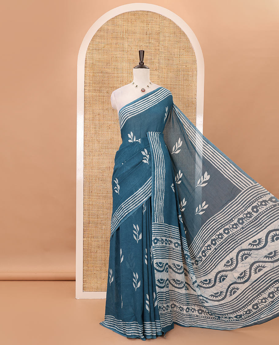 Blue leaf batik printed georgette saree, batik-printed striped border, floral-geometric batik printed pallu & batik printed blouse