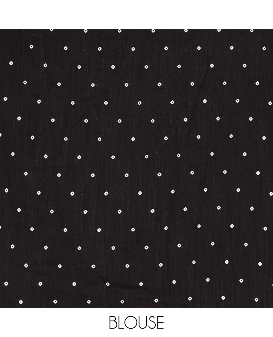 Borderless black zig-zag stripes gold foil printed, scallop-edged rangoli chiffon saree with a matching bandhani dotted blouse