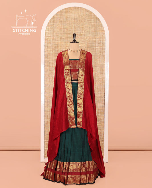 Bottle Green-Red Mercerised Cotton Half-Saree Features Plain with Contrast Peacock and Floral Creeper Zari Bordered Skirt, Paired with a Matching Blouse, and Comes with a Contrast Floral Creeper Zari Bordered Dhavani