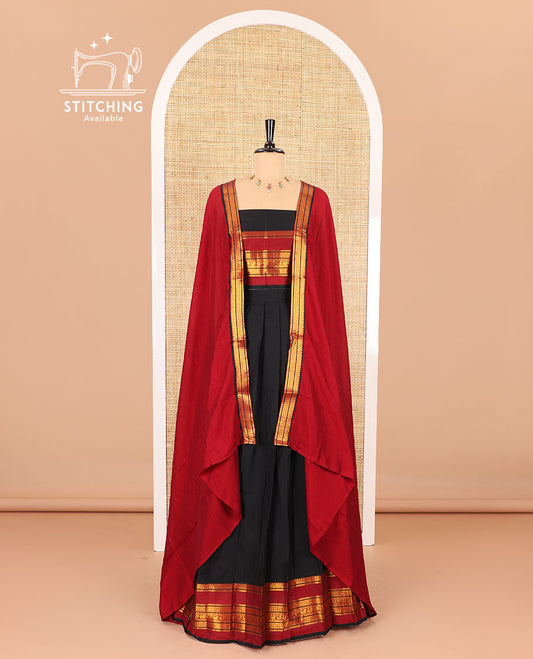 Black half-saree, plain with contrast varisai pettu traditional zari bordered skirt, matching blouse and a plain zari border contrast dhavani