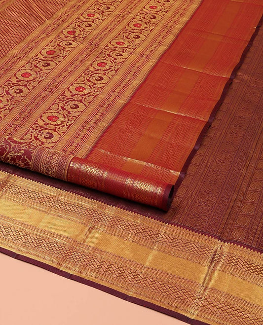 Maroon Kanchipuram Wedding Silk Saree, Gracefully Embellished with Floral Creeper Jacquard Design on Its Body, Highlighted by Zari Border of Rekku, Muthu, Neli, Zari Strips, and Jaal Designs, Grand Pallu, and Paired with a Matching Blouse