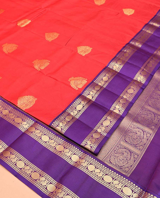 Red Vasundhara Lite Silk Mix Saree, Steeped in Richness of Zari Buttas All Over Its Body, Complemented by a Contrast Rettai Pettu Border of Salngai, Neli, Poun, and Mayil Designs, Grand Pallu, and Paired with a Contrast Blouse