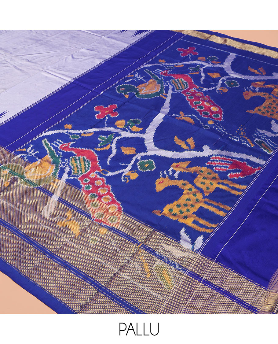 Grey Plain Ikkat Silk Saree, Complemented by a Contrast Temple Border of Diamond Designs, Pallu Features Ikkat Fauna Designs, and Paired with a Contrast Blouse