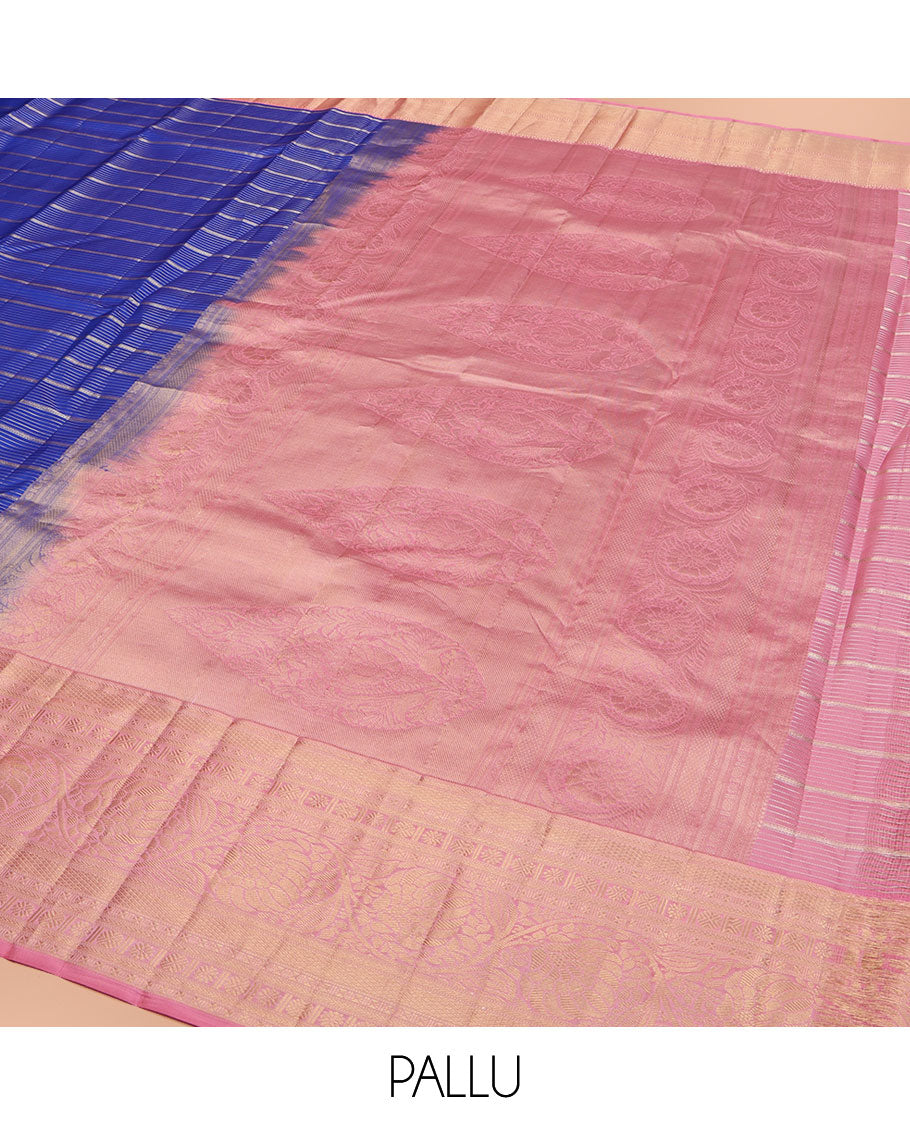 Blue Vasundhara Silk Saree, Beautifully Embellished with Zari Stripes All Over Its Body, Complemented by Contrast Border of Mayil Kann, Rudraksham, and Kodi Visiry Designs, Intricately Designed Pallu, and Paired with a Contrast Blouse