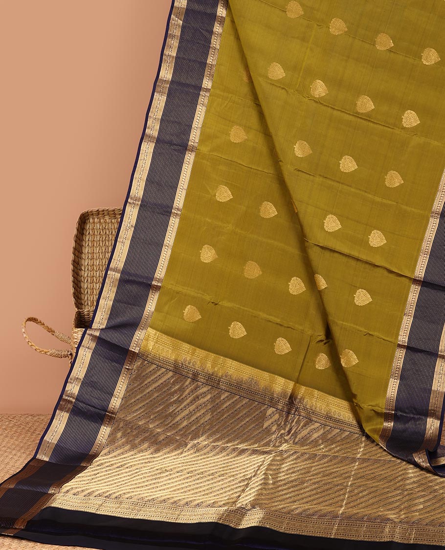 Green butta vasundhara elite silk saree with contrast zari striped border & striped, zari buttas zari design pallu