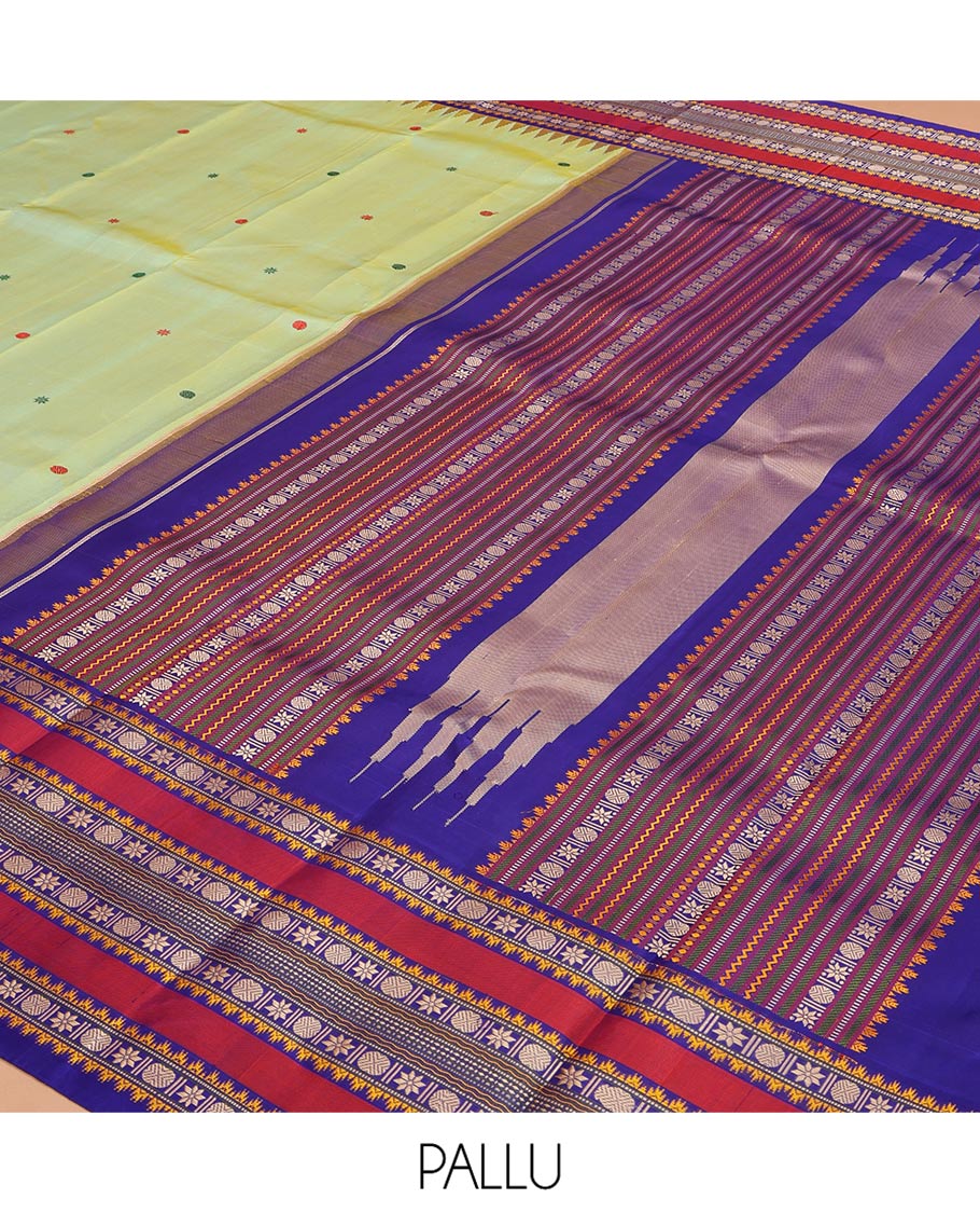 Green Kanchipuram Silk Saree, Beautifully Bedecked with Thread Buttas All Over Its Body, Complemented by a Contrast Border of Thazampoo Rekku, Muthu, Star Vanki, and Rudraksham Designs, Seppu Rekku Pallu, and Paired with a Contrast Blouse